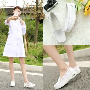 Comfortable white leather nursing shoes featuring air cushion sole and warm fur lining.