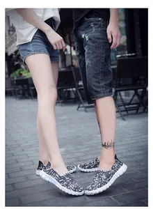 Detail view of breathable woven couple slip-on shoes in a street lifestyle setting.
