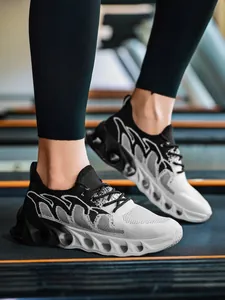 Close-up of breathable knit running shoes with shock-absorbing soles on a treadmill
