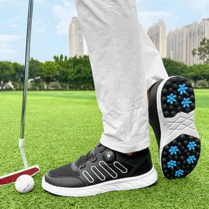 Men's lightweight black golf shoes with professional rotating lace system on grass