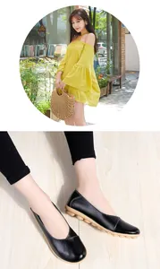 Detail view of women's black genuine leather flat peas shoes with soft rubber soles
