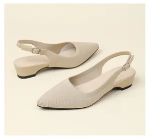 Detailed view of breathable beige knit pointed-toe slingback pumps with low heel