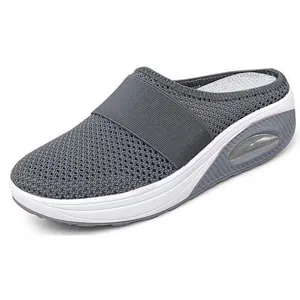 Detailed side view of grey mesh breathable women's platform mule with air cushion sole