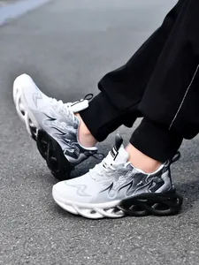 Close-up of black and white breathable sneakers with hollowed-out shock-absorbing soles