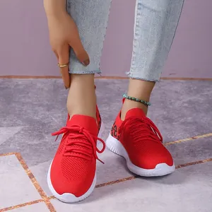 Vibrant red breathable mesh sneakers for women with leopard print detail and white soles