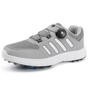 Men's grey golf shoes with lightweight design and quick-adjust rotating lacing system.