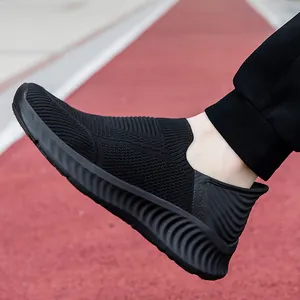 Breathable black fly-knit slip-on sneakers with lightweight soft-elastic sole for walking