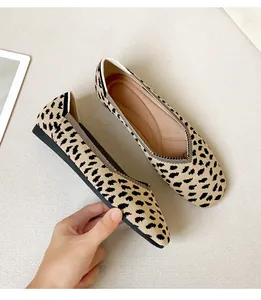 Close-up of leopard print knitted flat shoes with comfortable square toe design
