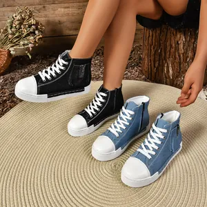 Hoge canvas sneakers met plateauzool en rits aan de zijkant in zwart en blauw denim.