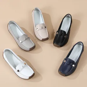 Top-down view showing multiple colors of women's soft sole slip-on casual loafers.
