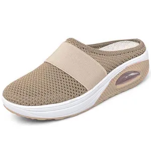 Detail view of khaki mesh closed-toe mule featuring a thick platform air cushion sole.