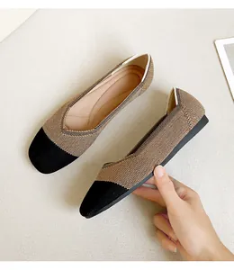 Detailed view of breathable square toe knit flats featuring a stylish two-tone pattern