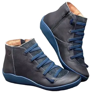 Stylish casual women's flat ankle boots featuring dark grey leather and contrast blue laces
