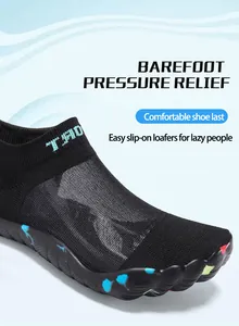 Detailed view of black mesh five-finger barefoot water shoe with colorful speckled sole