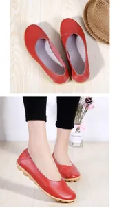 Detailed view of women red cowhide leather loafers featuring soft flexible rubber sole
