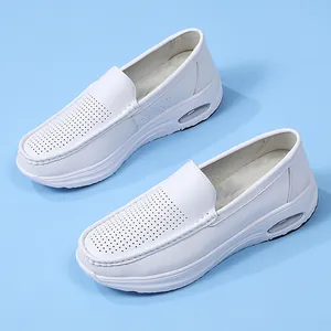 Comfortable white leather air cushion nurse shoes with breathable perforated upper design