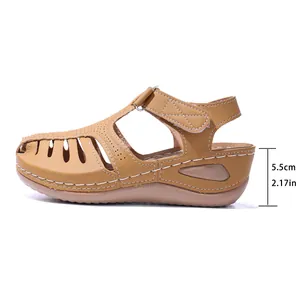 Tan vintage Roman wedge sandals with a 5.5cm heel height and stylish cutout toe.