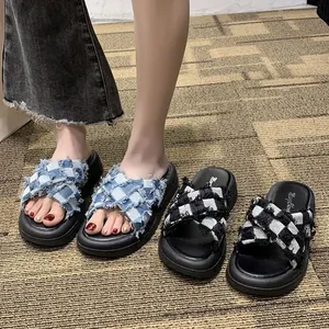 Stylish women's checkered cross-strap platform slides with frayed denim edges for summer