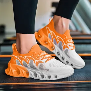 Breathable orange and white flyknit running shoes for men with shock-absorbing blade soles