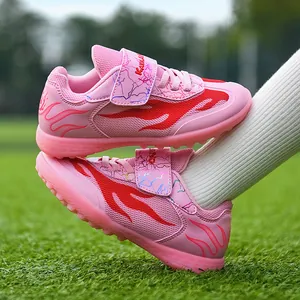Pink breathable mesh children's soccer shoes with turf cleats for soccer training