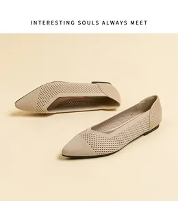 Close-up of elegant beige knitted pointed-toe flats showing breathable mesh detail