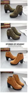 Detail view of chunky heel ankle boots with buckle and lace-up in green and tan.