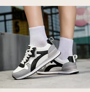 Women's retro casual running sneakers in white, grey and black color-block design