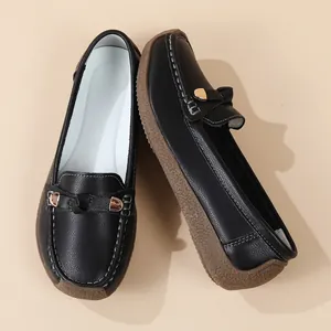 Close-up of black leather loafers with comfortable soft textured soles