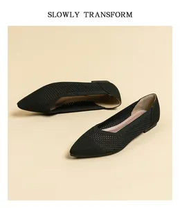 Elegant black pointed-toe knitted flat shoes with hollow-out breathable design for women.