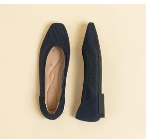 Detail view of navy blue mesh knit ballet flats with square toe and soft insole.