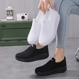 Breathable women's mesh walking shoes featuring thick rocker soles for all-day comfort