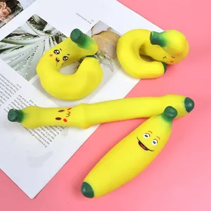 Detailed view of banana squishy toys with various cute expressions and flexible TPR texture