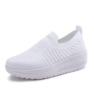 White women's knit slip-on walking shoes with comfortable thick rocker sole design