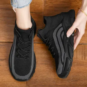 Comfortable breathable knitted women's sports sneakers with thick soles in black and grey