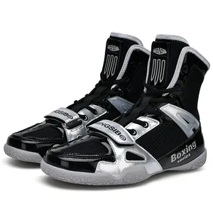 Professional high-top boxing shoes in black and silver finish with non-slip rubber sole