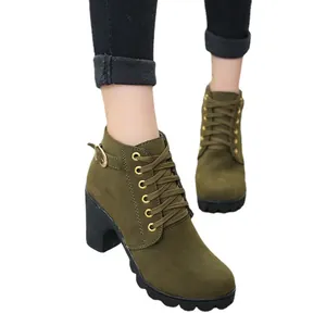 Stylish olive green chunky high heel ankle boots featuring lace-up and buckle detail