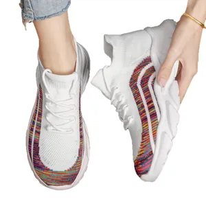 Women's breathable knitted sneakers with colorful stripes and chunky platform soles.