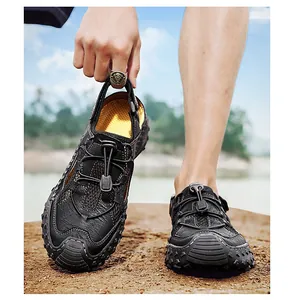 Outdoor view of black leather men's sandals featuring breathable mesh and elastic quick-laces