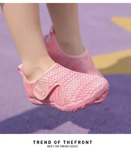 Close-up of pink breathable mesh baby beach shoes with soft protective toe cap