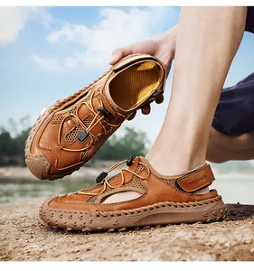 Macro detail of breathable men's brown leather sandals with adjustable strap and durable sole