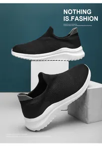 Detailed view of lightweight black knit sock sneakers with shock-resistant white soles