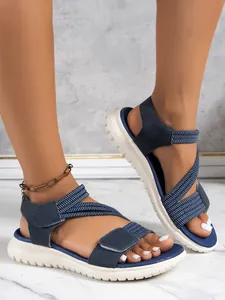 Comfortable navy blue wedge sandals for women with crisscross straps and velcro