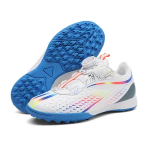 Professional children's TF turf soccer shoes with rotary button closure and rainbow accents