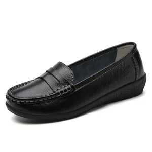Elegant black pebbled leather loafers for women featuring comfortable flat nursing soles