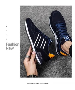 Vista detallada de zapatillas deportivas azul marino para hombre con diseño de tres rayas
