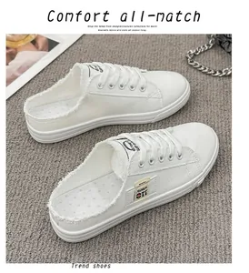 Zapatillas mule casuales de lona blanca con bordes deshilachados y cordones de moda