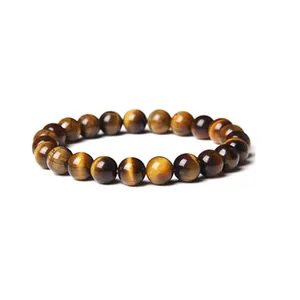 Gros plan d'un bracelet en œil de tigre naturel avec des perles rondes de 8mm
