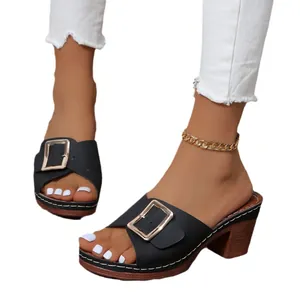Elegant women's black high-heeled mule sandals with gold buckle and chunky heel