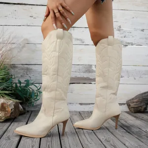 Elegant cream embroidered knee high boots with pointed toe and stiletto heels
