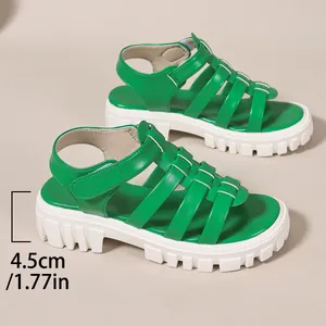 Detailed view of vibrant green platform Roman sandals showing 1.77-inch heel height measurement